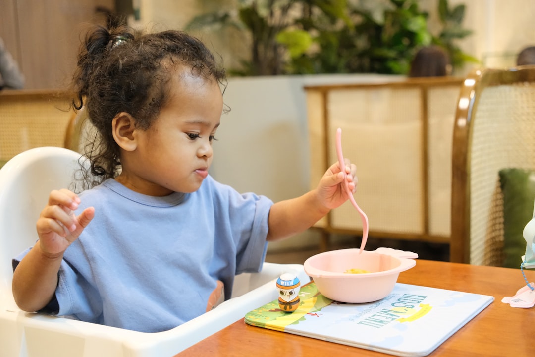 Baby eating safely in a high chair